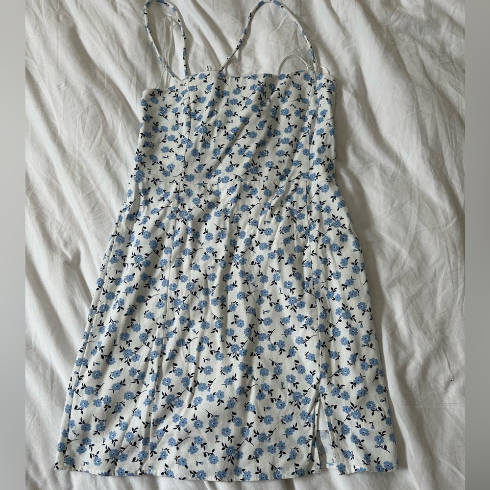 White dress with blue flowers